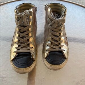 Golden Goose Silver Leather High-Top Slide in silver glitter with blue leather .